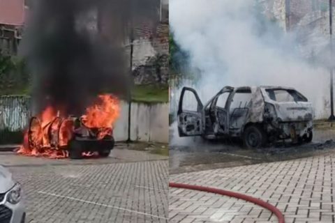 Mulheres descem de carro antes dele ser consumido pelo fogo em Manaus