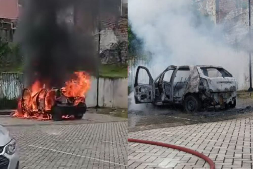 Mulheres descem de carro antes dele ser consumido pelo fogo em Manaus