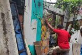Homem morre esmagado após árvore cair sobre casa durante forte chuva em Manaus