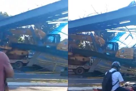 Carreta que transportava trator e escavadeira destrói passarela na avenida Torquato Tapajós