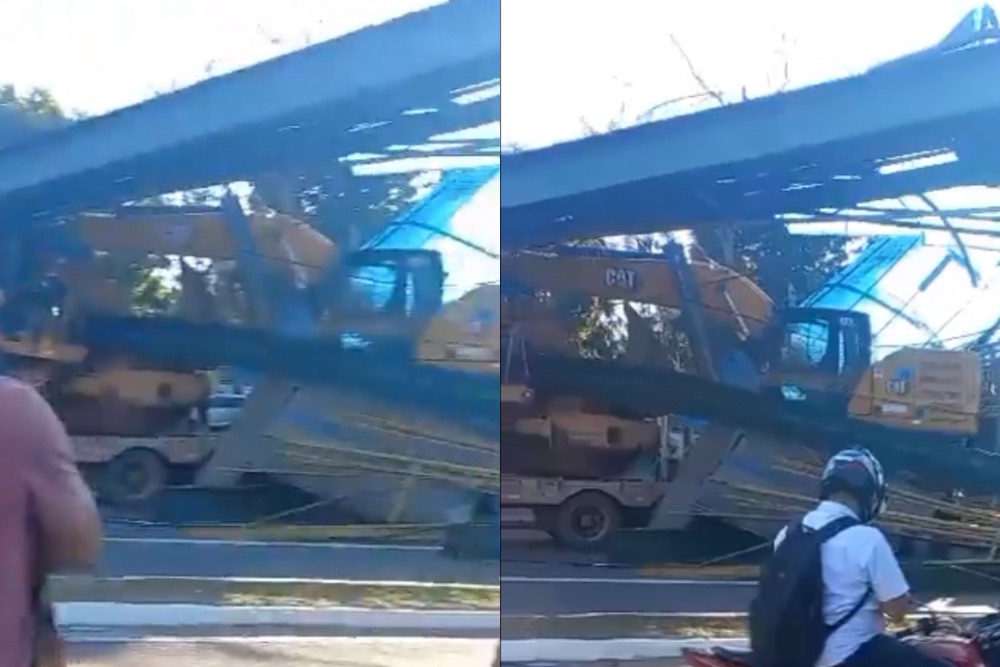 Carreta que transportava trator e escavadeira destrói passarela na avenida Torquato Tapajós Carreta que transportava trator e escavadeira destrói passarela na avenida Torquato Tapajós