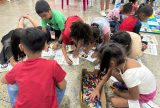 Crianças e adolescentes migrantes e refugiados são atendidos pelo projeto 'Super Curumins' em Manaus