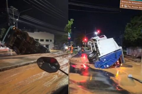 Adutora rompe e caminhão de lixo cai no buraco, em frente ao Porão do Alemão. Veja