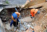 Obra recupera rede de drenagem profunda no bairro Educandos