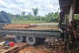 Madeiras apreendidas de crimes ambientais em Manacapuru são doadas ao Exército