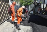 Recuperação asfáltica no bairro Aleixo restaura mobilidade de vias