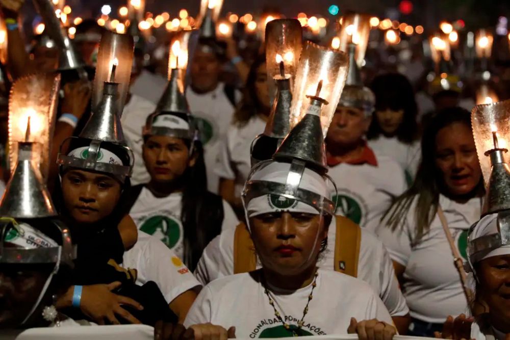 Extrativistas marcham na COP por reconhecimento na proteção florestal