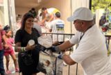 Doação de peixe beneficia milhares de famílias durante ação do Governo Presente no Japiim