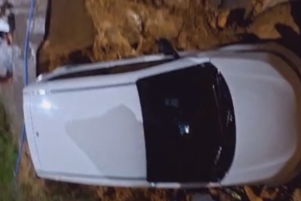 Motorista tem carro danificado após cair em buraco em ponte no Tarumã