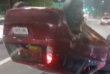 Carro capota na avenida Constantino Nery, em Manaus